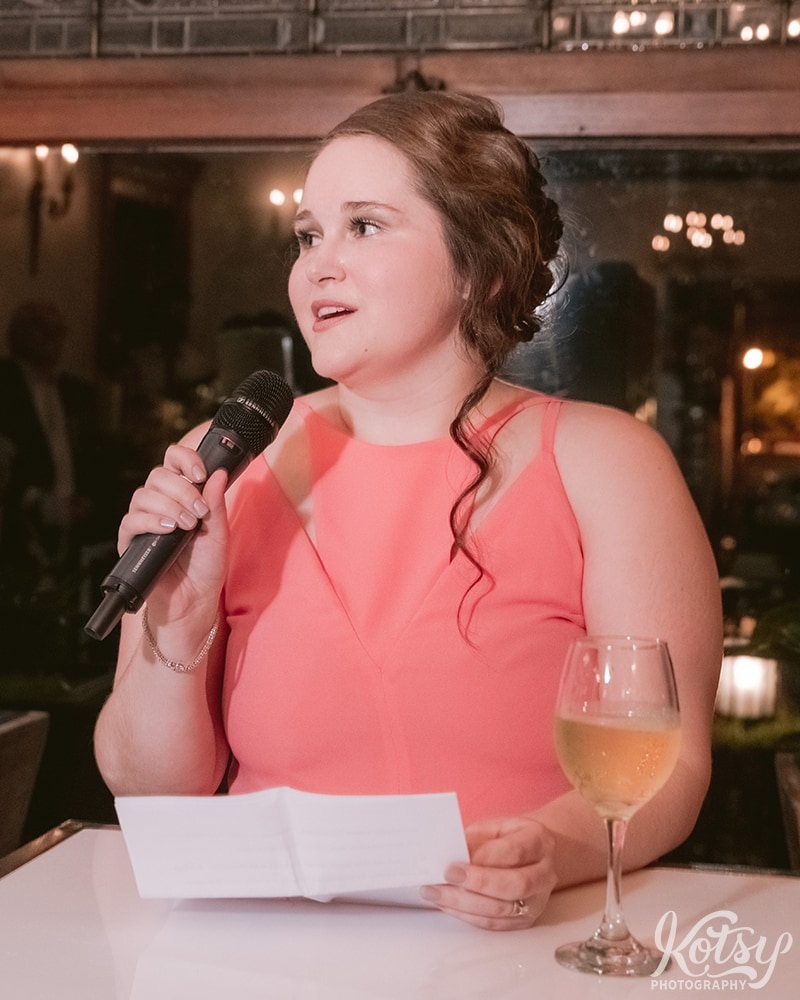A woman makes a speech at a Berkeley Bicycle Club wedding reception in Toronto