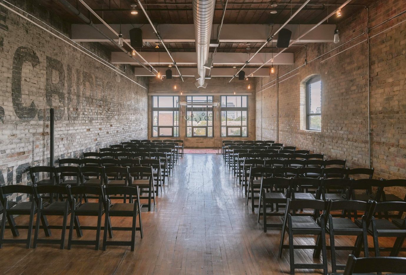 A look down the aisle before a wedding ceremony at Burroughes Building in Toronto, Canada