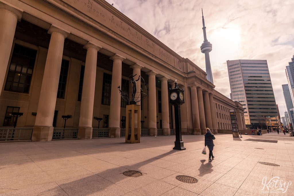 A woman walks in an empty Sir John A. Macdonald Plaza in front of Union Station during the Covid-19 pandemic in Toronto