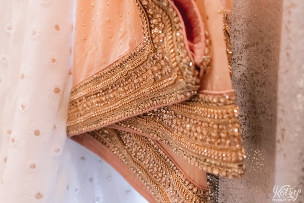 A close of shot of the south asian wedding dress