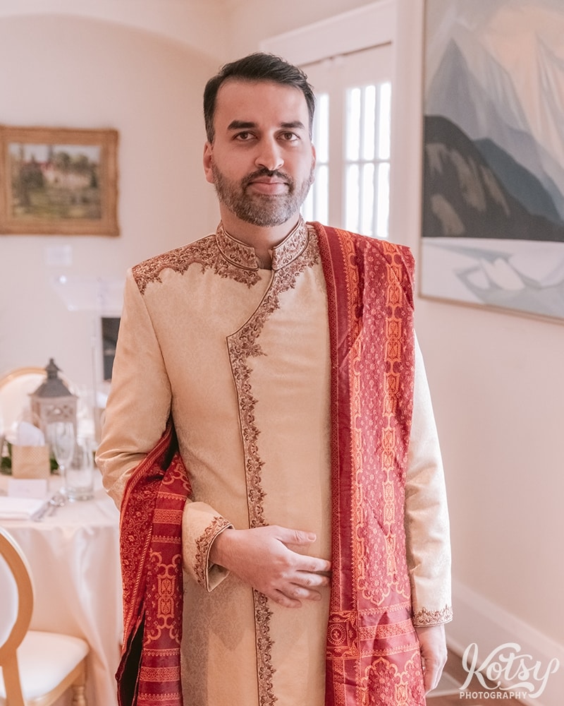 A portrait of a groom in south asian wedding attire. Photographed at Guild Inn Estates