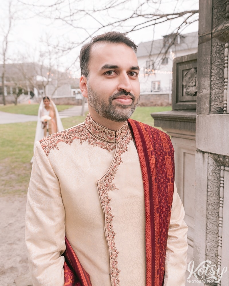 A close up shot of a groom waiting for his bride to arrive for first look. Photographed at Guild Park and Gardens in Scarborough.