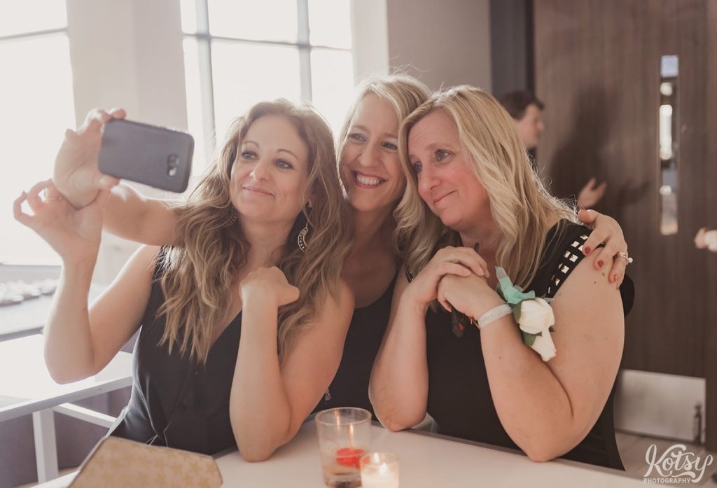 A group of 3 women pose for a selfie at a Universal EventSpace wedding in Vaughan