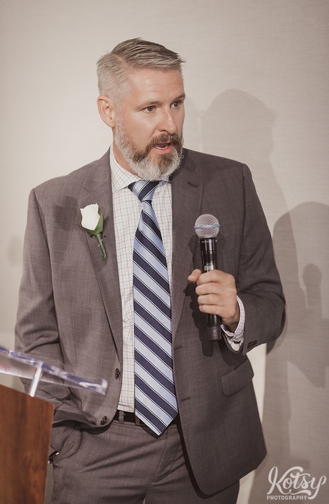 A close up shot of a man making a speech at a wedding ceremony at Universal EventSpace in Vaughan