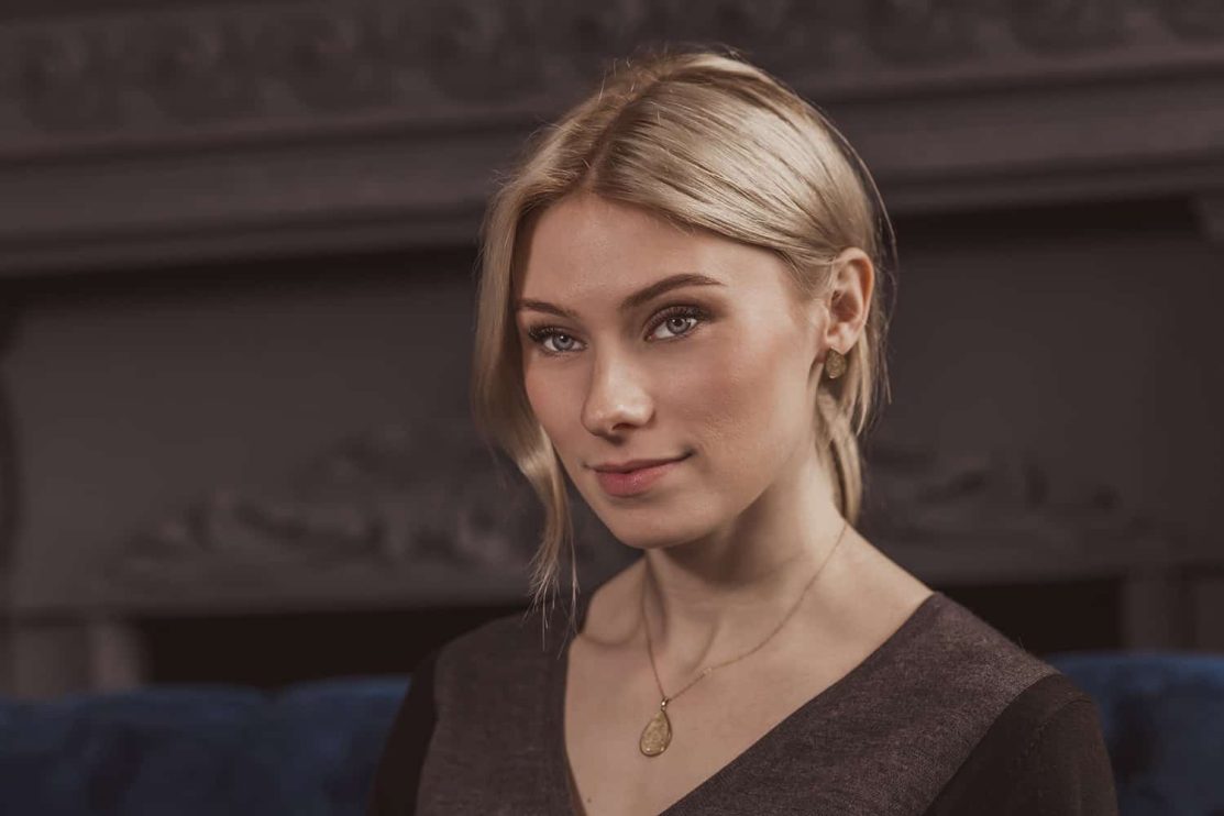 A close-up shots of a female posing for a portrait at a Toronto photo studio