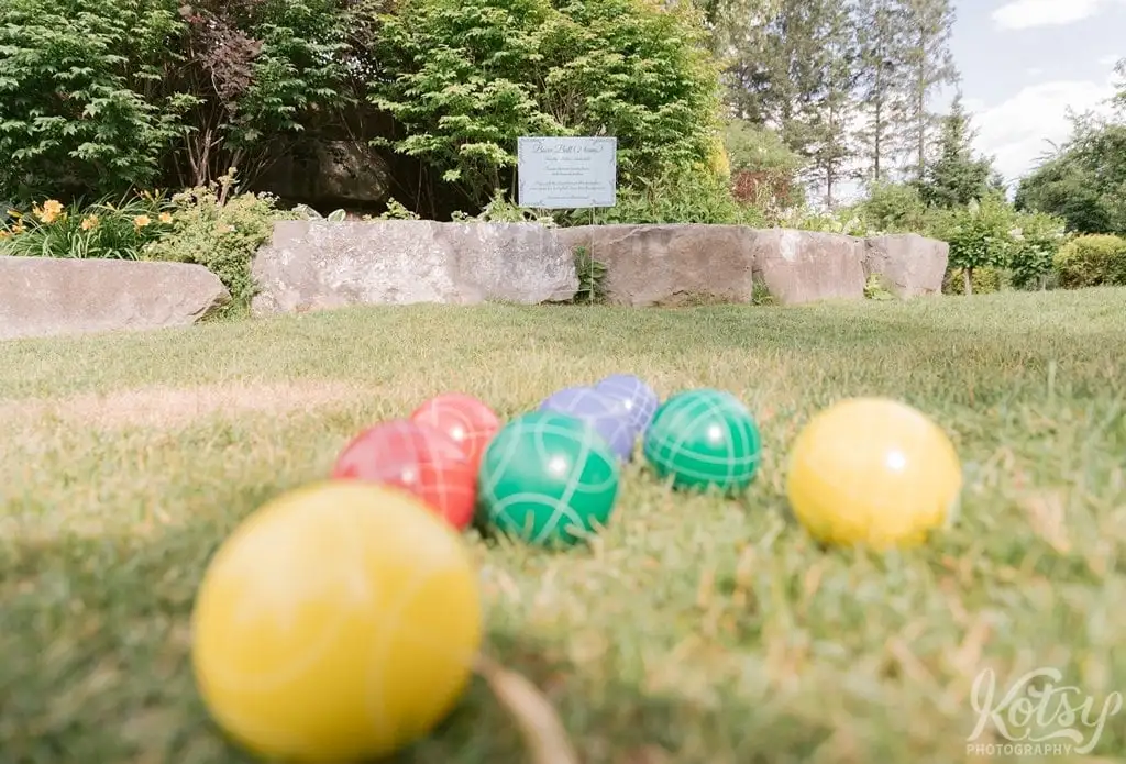 Close up shot of bocce balls in grass