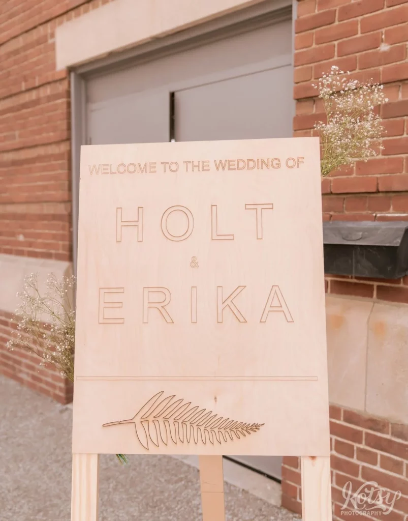 A laser engraved wooden sign for a wedding outside Royal Canadian Legion 344