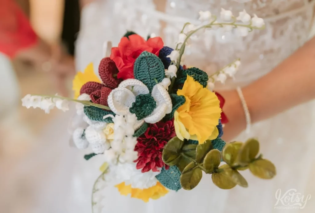 Close up of a bride's crocheted bouquet.