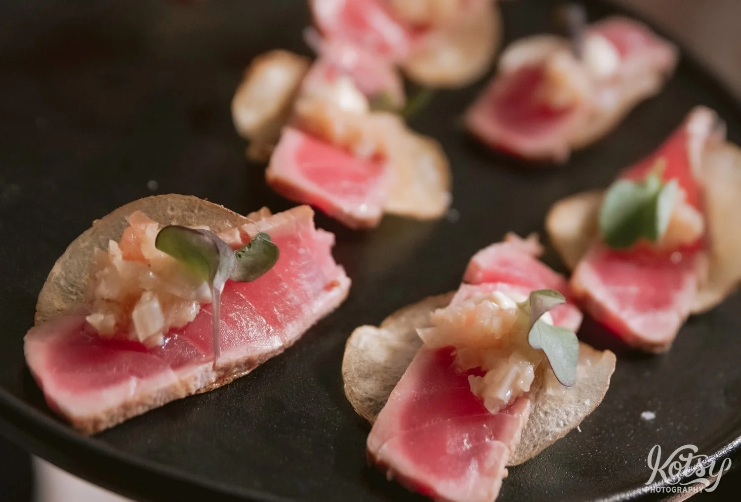 Ahi Tuna bites are seen on a serving tray