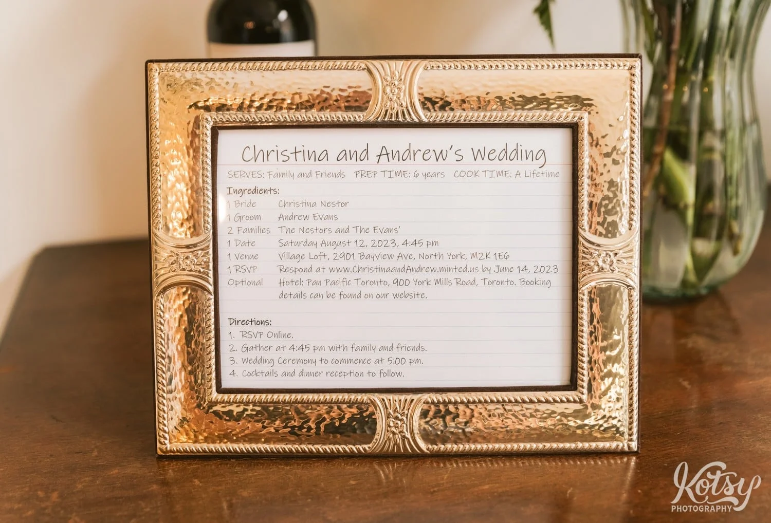 A framed invite for a wedding that is presented like a cooking recipe